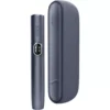 Dark blue IQOS tobacco heating device shown beside its rounded charging case.