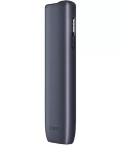 Profile view of a dark gray IQOS heat-not-burn device with a side button and indicator window.