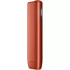 Copper-orange IQOS heated tobacco device shown from the side with a vertical control panel and buttons visible on the right edge