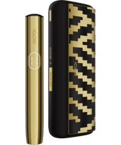 Gold IQOS tobacco heating device shown beside a black-and-gold patterned protective case, highlighting a premium minimalist design.